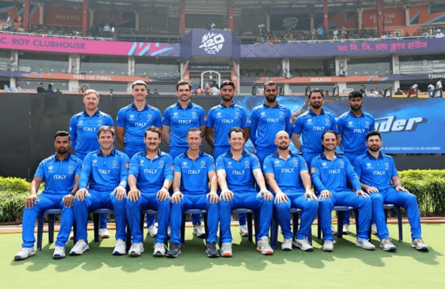 The Italy squad lined up in blue playing kit at a T20 World Cup venue